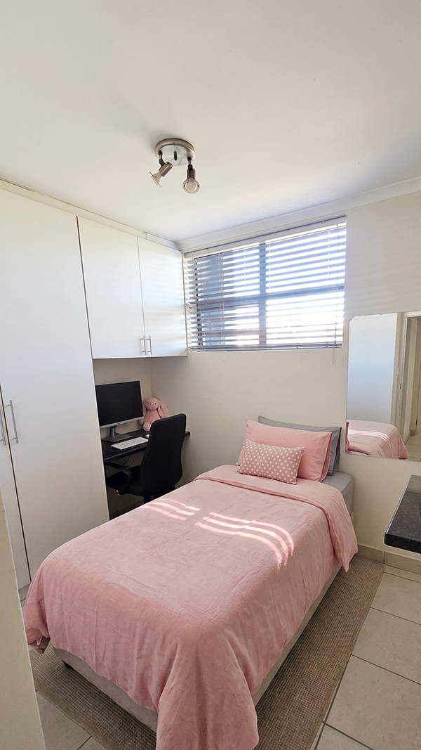 Second bedroom with built-in cupboards